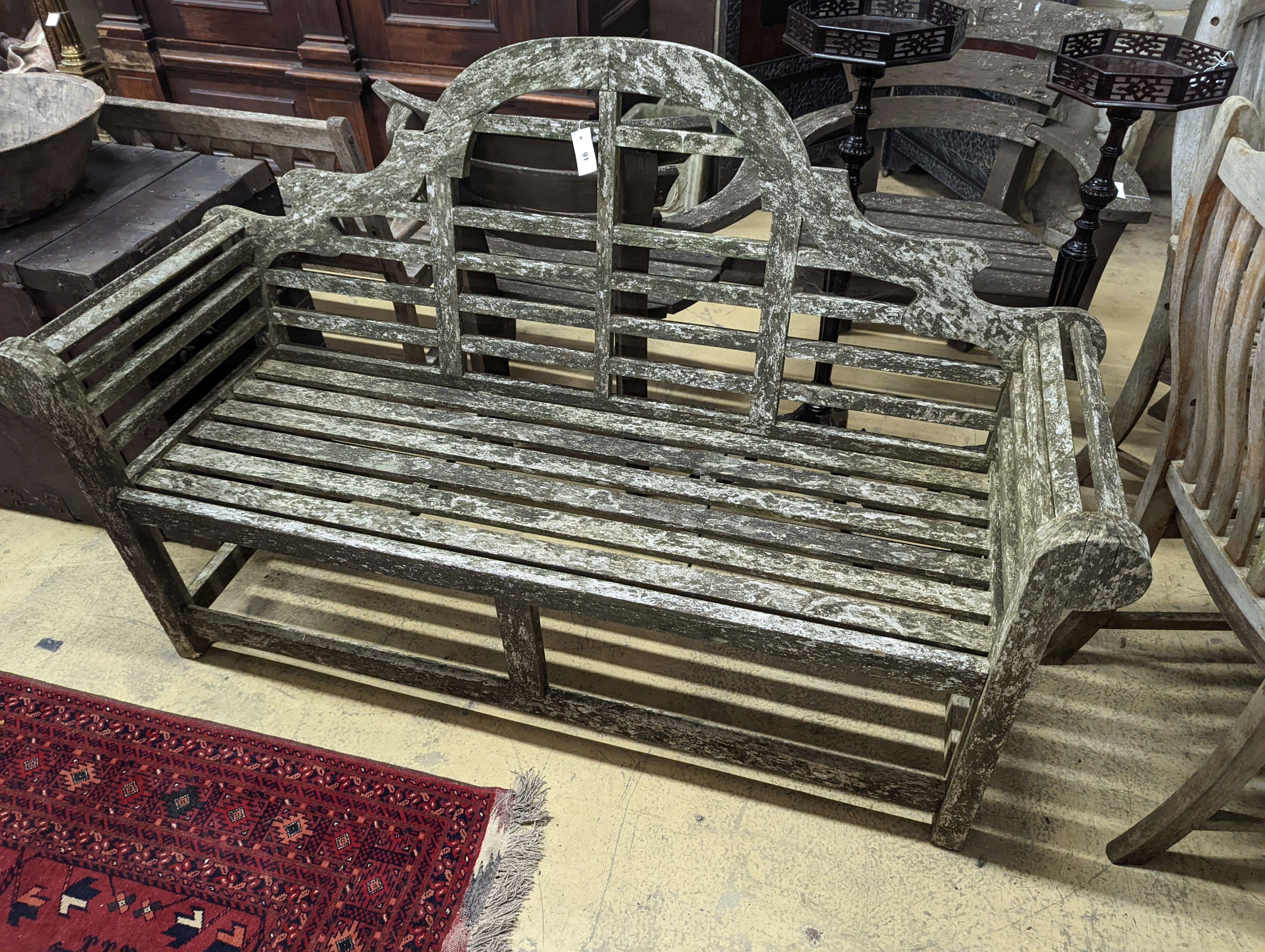 A Lutyens style teak garden bench, length 160cm, depth 50cm, height 106cm